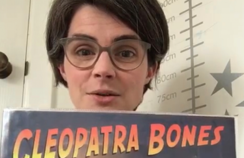 Chloe Smith MP Holding Cleopatra Bones Book