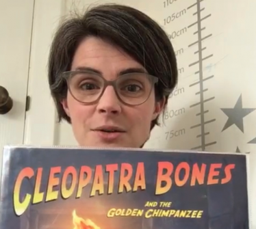 Chloe Smith MP Holding Cleopatra Bones Book